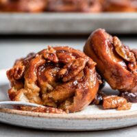 carrot cake sticky buns with a bite taken out