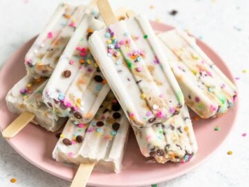 popsicles filled with cookie dough, chocolate chips, and rainbow sprinkles