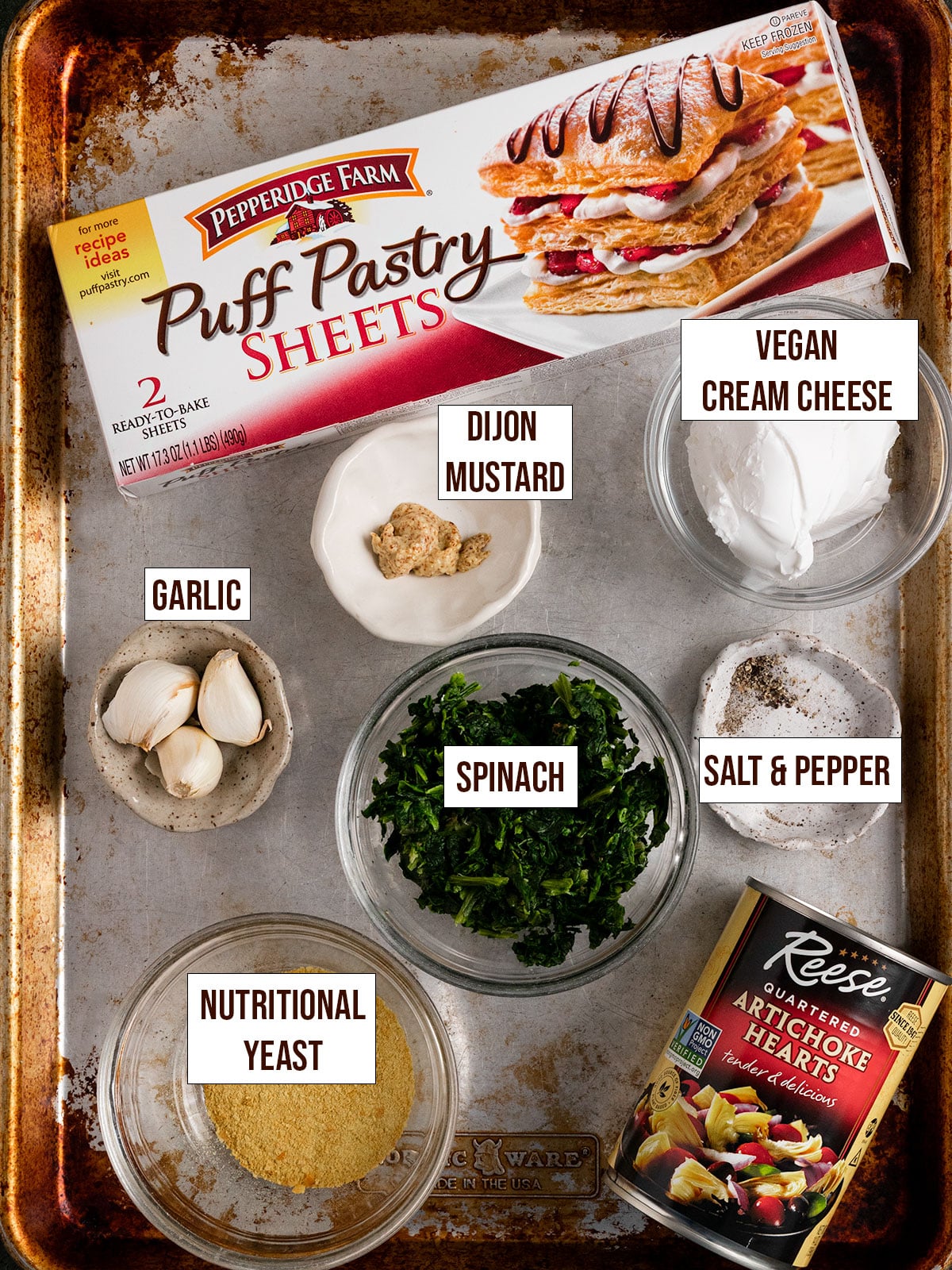 labeled ingredients for spinach artichoke puff pastry.