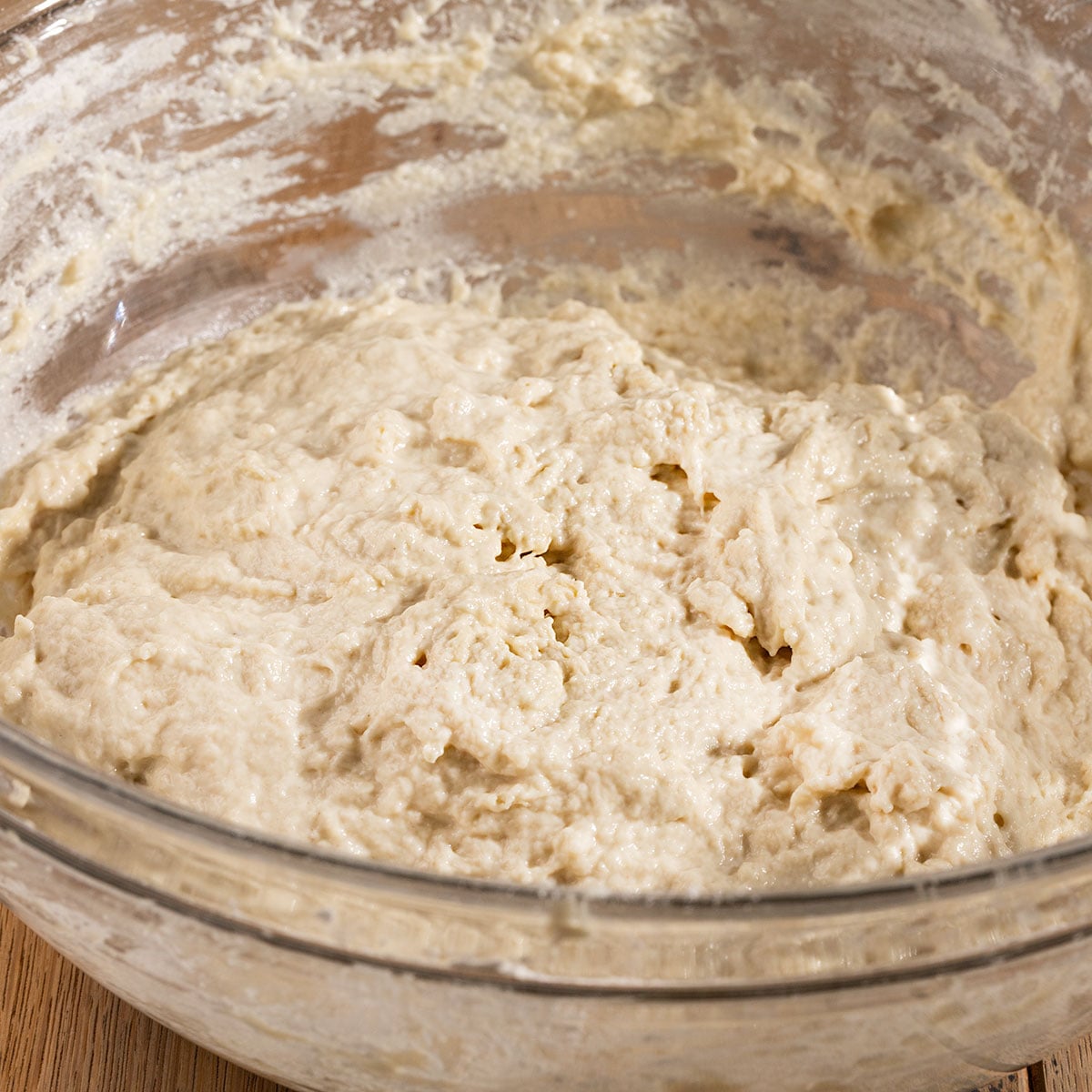 focaccia bread dough in a bowl before proofing.