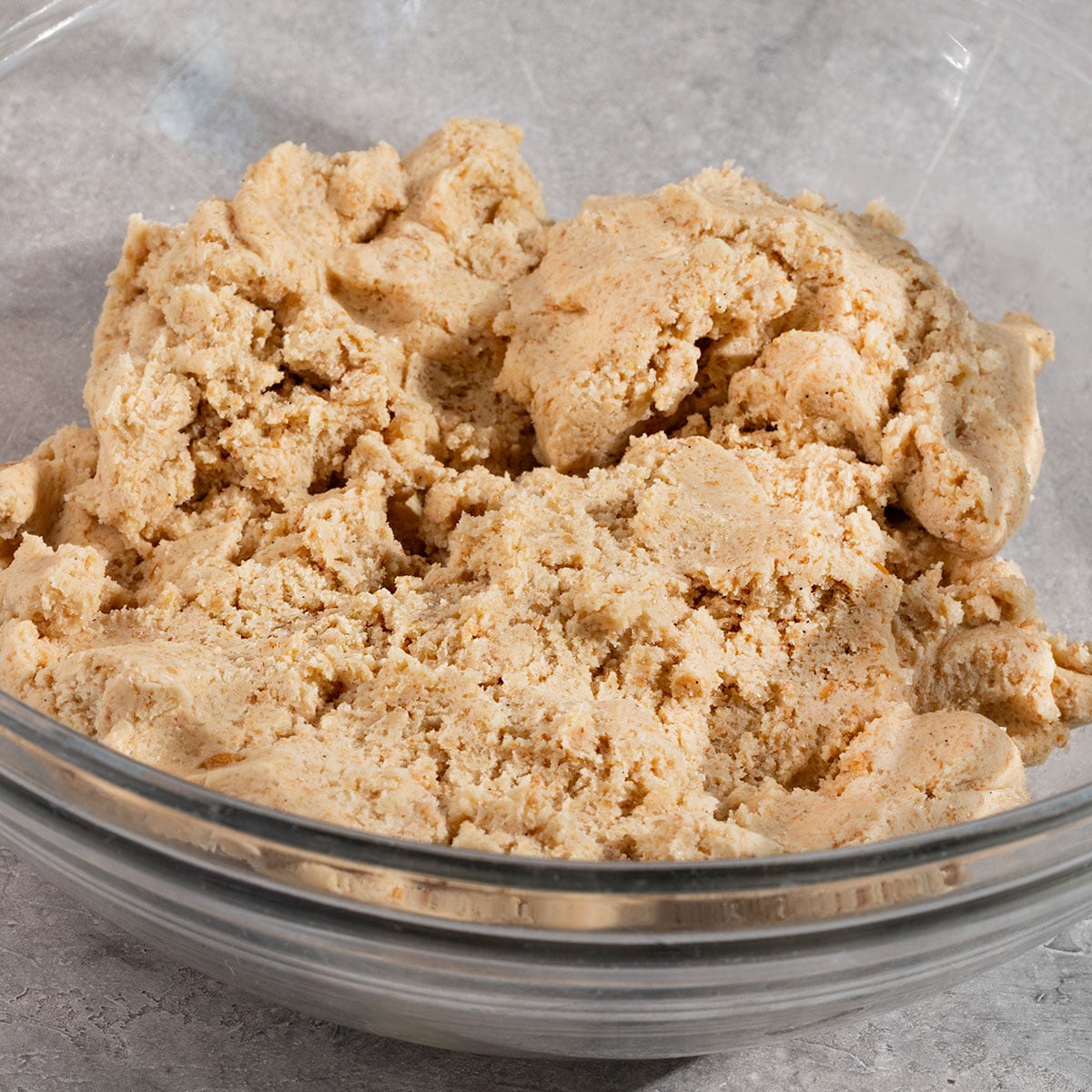 glass bowl filled with cookie dough.