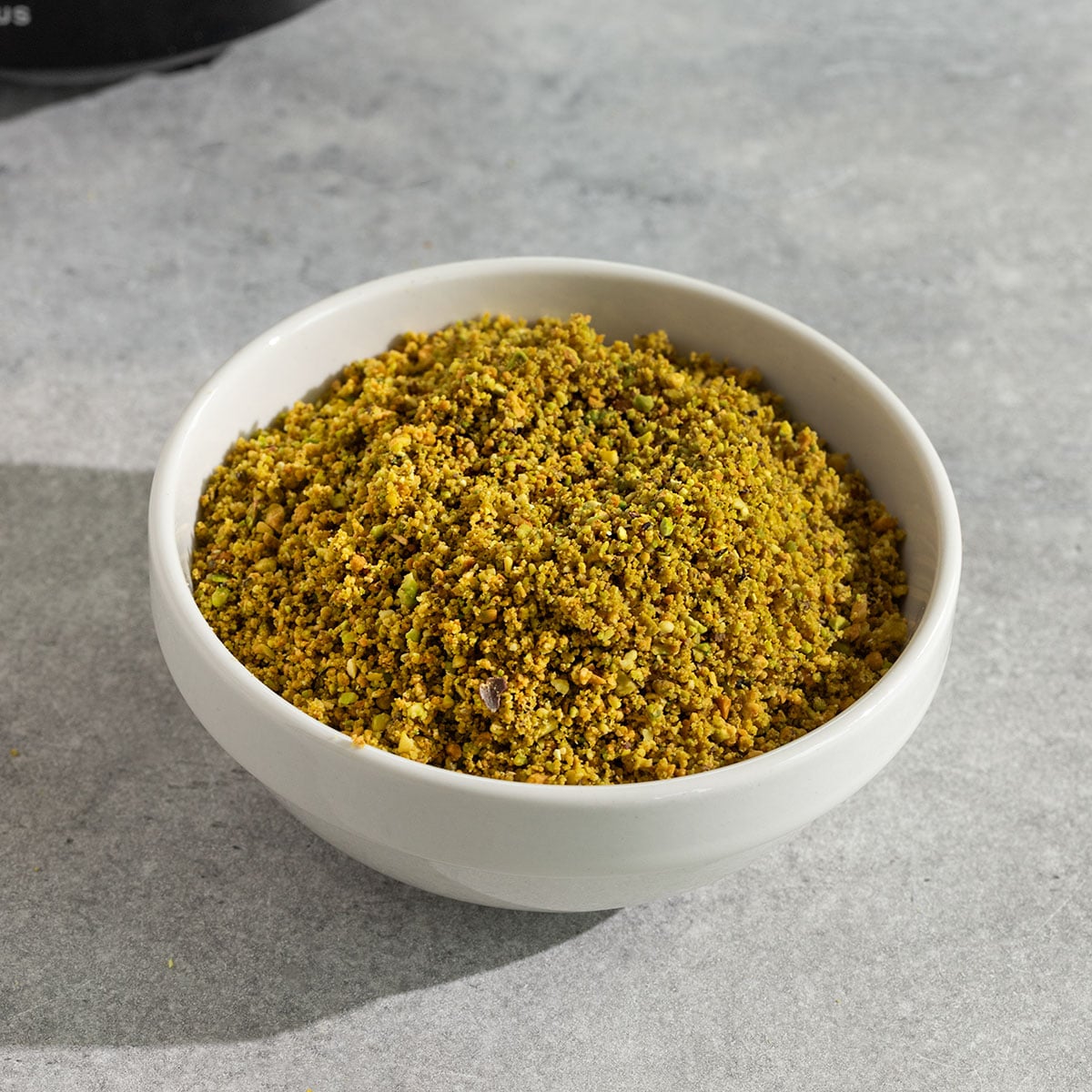 bowl of ground pistachios.
