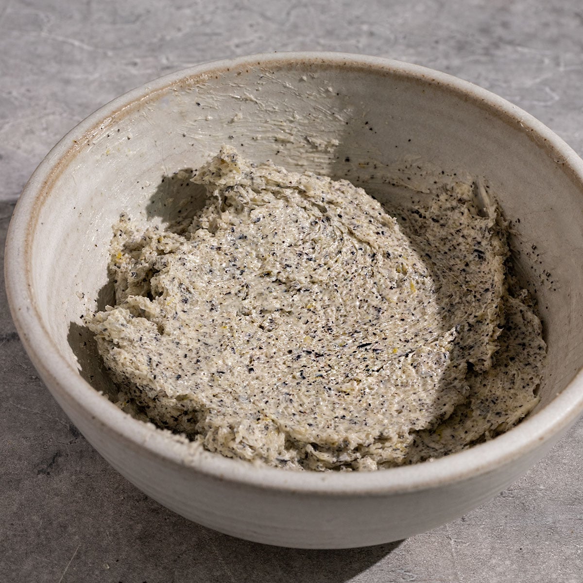 bowl of butter, earl grey tea, lemon zest, and sugar mashed together.