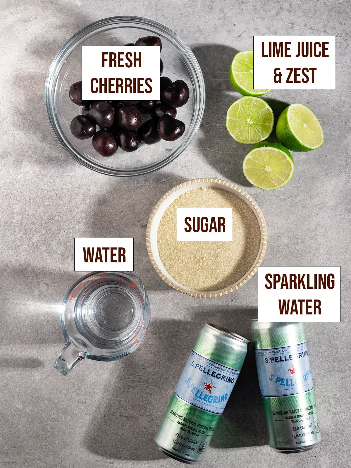 labeled ingredients including cherries, limes, sugar, sparkling water, and water.