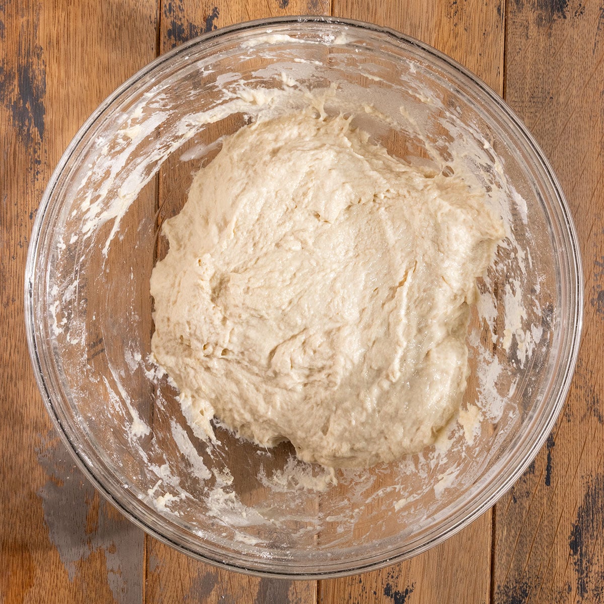 bowl of roughly mixed bread dough before rising.